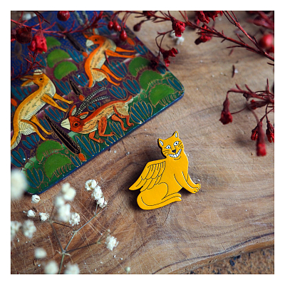 Брошка Билла Трейлора «Крылатый котик»